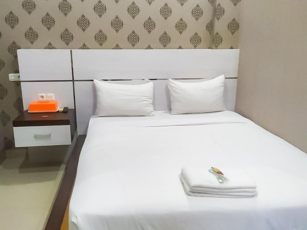 Reddoorz Syariah Near Sultan Syarif Kasim II Airport Hotel Pekanbaru Buitenkant foto